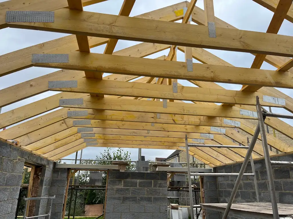 Trussed roof structure inside the new extension, viewed from below